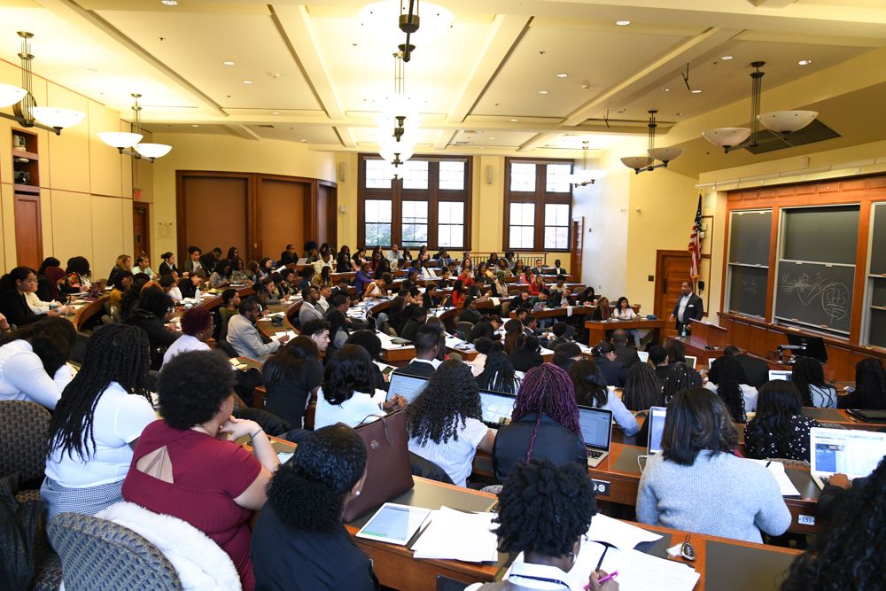 Pre-law students in a lecture hall at NBPLC