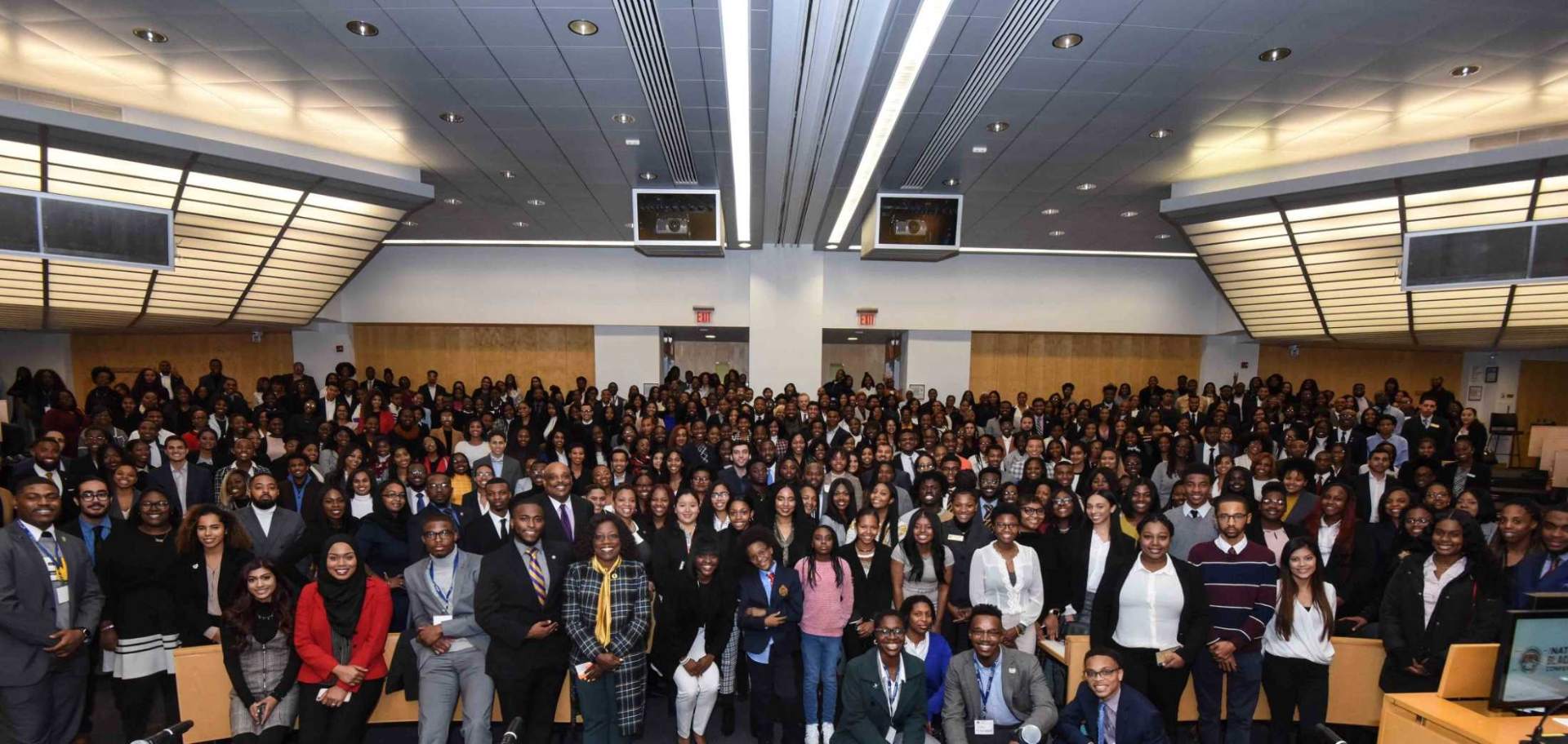 Full auditorium group photo of NBPLC attendees